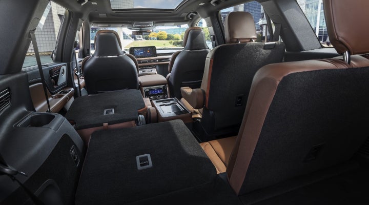 One side of the PowerFold® third-row seat and a second-row seat are folded forward in the 2026 Lincoln Aviator® SUV. | Courtesy Lincoln in Altoona PA