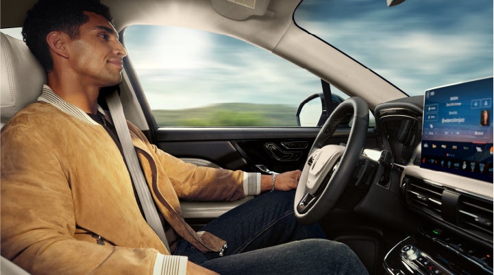 A person is shown using Lincoln BlueCruise hands-free highway driving technology on a divided highway in a hands-free Blue Zone. | Courtesy Lincoln in Altoona PA