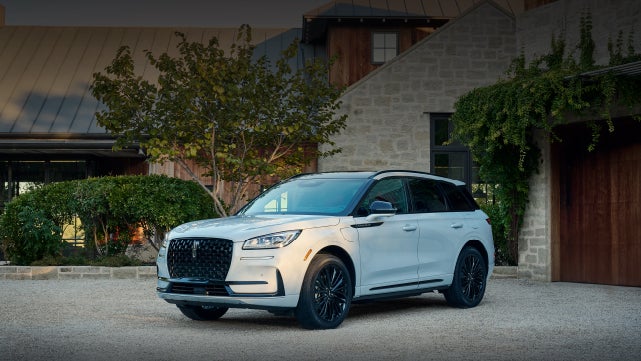 A 2026 Lincoln Corsair® SUV is parked in front off a luxury home. | Courtesy Lincoln in Altoona PA