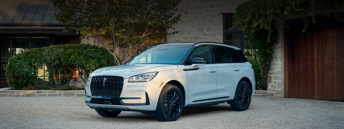 A 2026 Lincoln Corsair® SUV is parked in front off a luxury home. | Courtesy Lincoln in Altoona PA