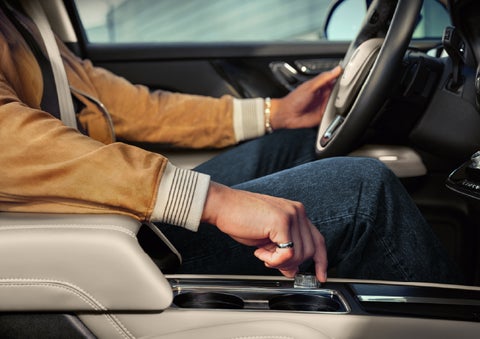 The driver of a 2026 Lincoln Corsair® SUV is shown selecting a drive mode. | Courtesy Lincoln in Altoona PA