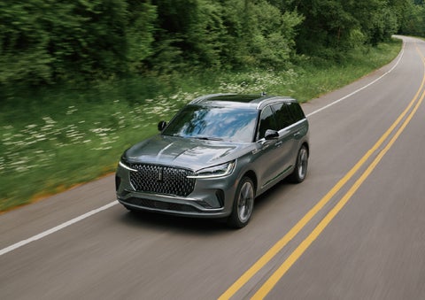 A 2027 Lincoln Aviator® SUV is being driven down a road. | Courtesy Lincoln in Altoona PA