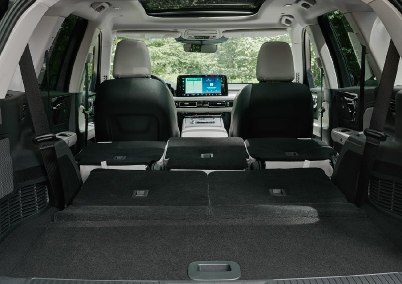 A rear to front view of the interior of a 2027 Lincoln Aviator® Black Label™ SUV shows the third and second rows folded flat | Courtesy Lincoln in Altoona PA
