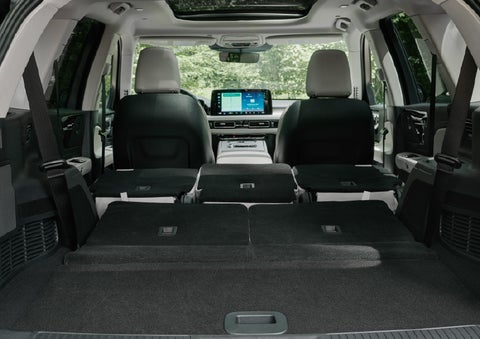 A rear to front view of the interior of a 2027 Lincoln Aviator® Black Label™ SUV shows the third and second rows folded flat | Courtesy Lincoln in Altoona PA
